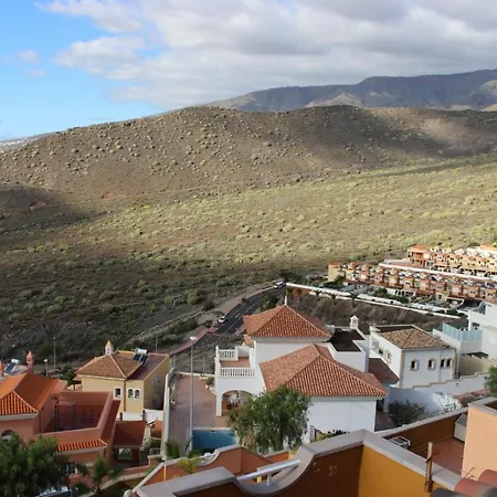 With A Serene Ocean And Mountain View Apartament