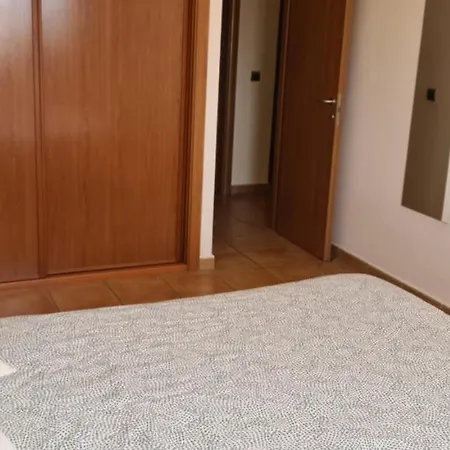 With A Serene Ocean And Mountain View Apartament